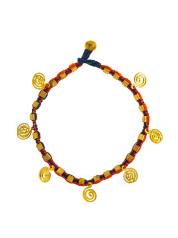 Charming with a twist, this beautiful anklet is made with ethnic spiral motifs with red and blue cotton thread