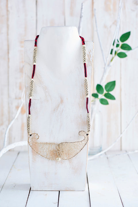 Gypsy Dhokra necklace with silver coated brass beads and a paisley mesh pendant in black and red cotton thread