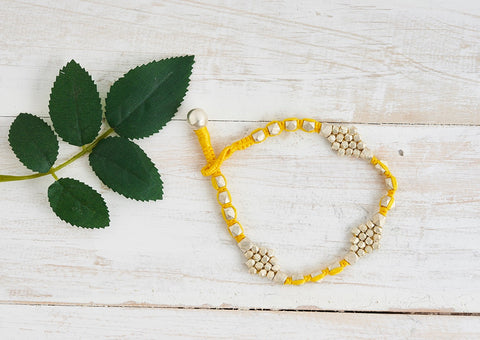 Gypsy Dhokra anklet with silver metal alloy and yellow cotton thread